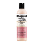 Bottle of Aunt Jackie's hair care product on a white background