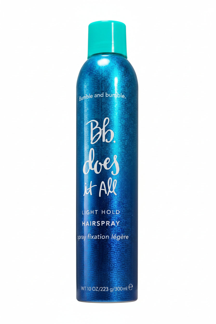 Blue hairspray can with 'Bumble and bumble' branding on a white background