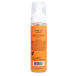 Camille Rose Spiked Honey Curl Define Mousse 8oz bottle with gold pump and amber label on white background.