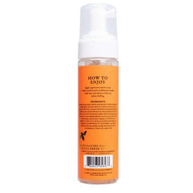 Camille Rose Spiked Honey Curl Define Mousse 8oz bottle with gold pump and amber label on white background.