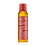 Skincare serum bottle with red cap and label on a white background