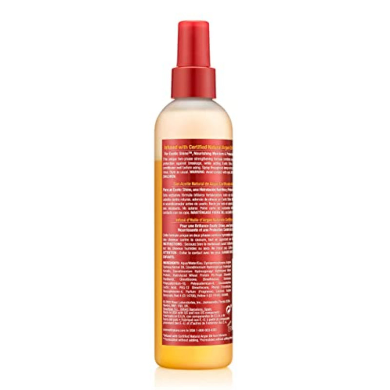 Hair spray bottle with red cap and label on a white background