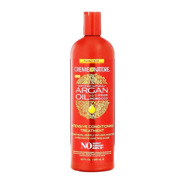 Red bottle of Creme of Nature Argan Oil Intensive Conditioning Treatment on a white background
