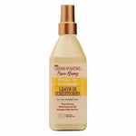 Creme of Nature Pure Honey leave-in conditioner bottle on a white background