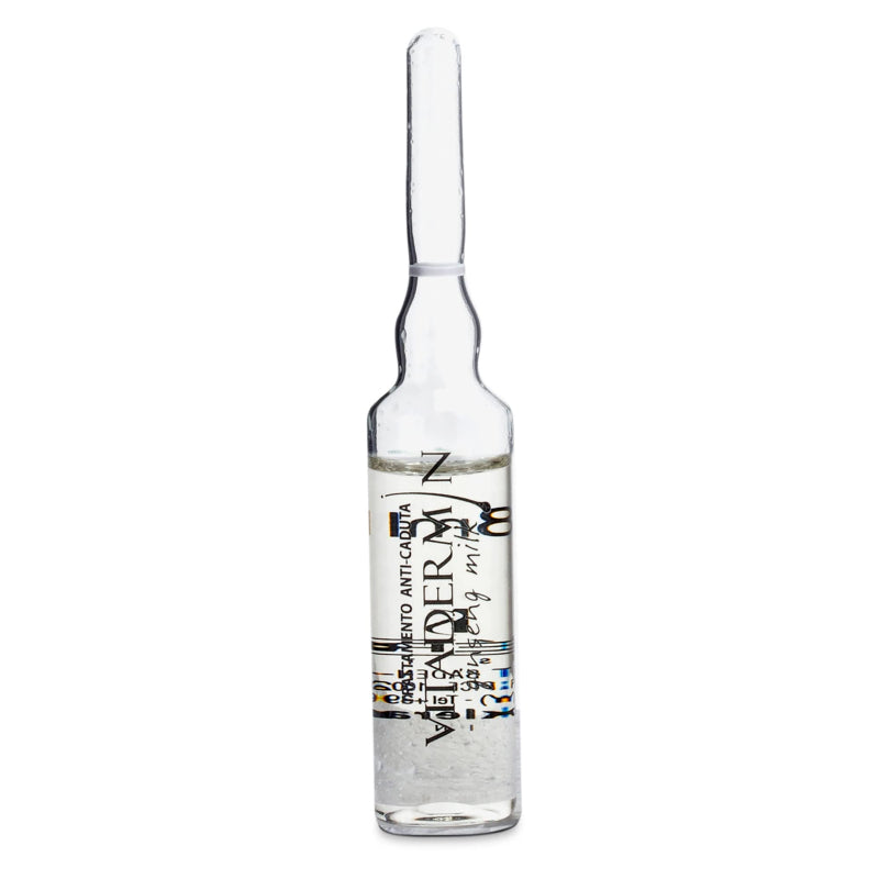 Glass ampoule with a label on a white background