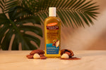 Palmer's Cocoa Butter Formula body oil bottle on a white background