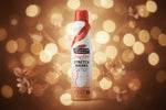 Silver's Cocoa Butter Formula Stretch Marks Spray Lotion in a white and orange spray can with a red cap, on a white background.