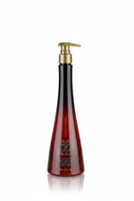 Red conditioner bottle with pump and visible label on a white background