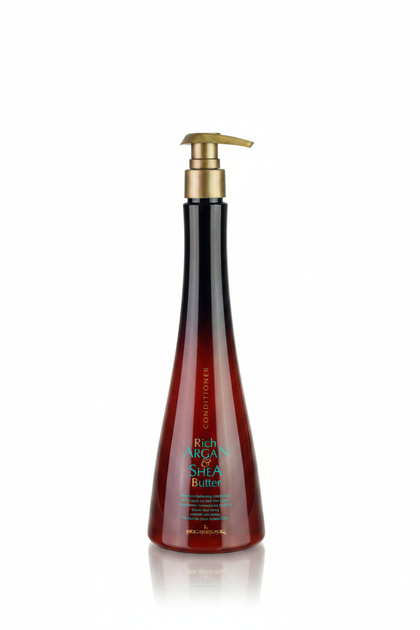Red conditioner bottle with pump and visible label on a white background