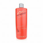 Red shampoo bottle with silver cap on a white background