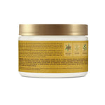 Jar of hair care product with gold lid and label on a white background