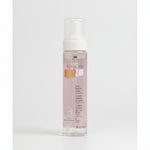 A pump bottle of Keracare Foam Wrap Set Lotion Extra Hold, 240ml, with a pink label.