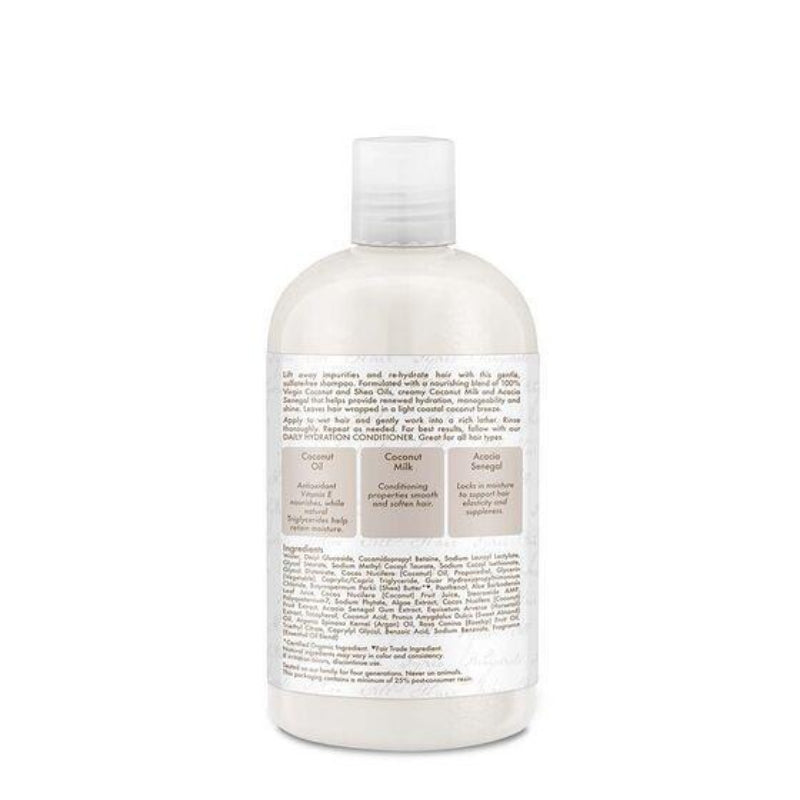 Bottle of coconut milk conditioner on a white background