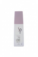 SP brand lotion bottle with purple cap on a white background