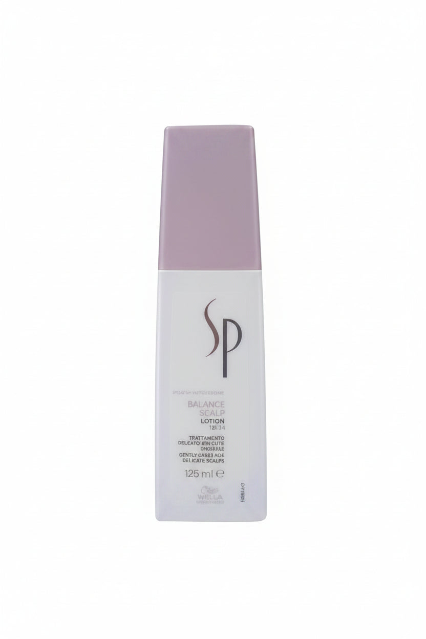 SP brand lotion bottle with purple cap on a white background